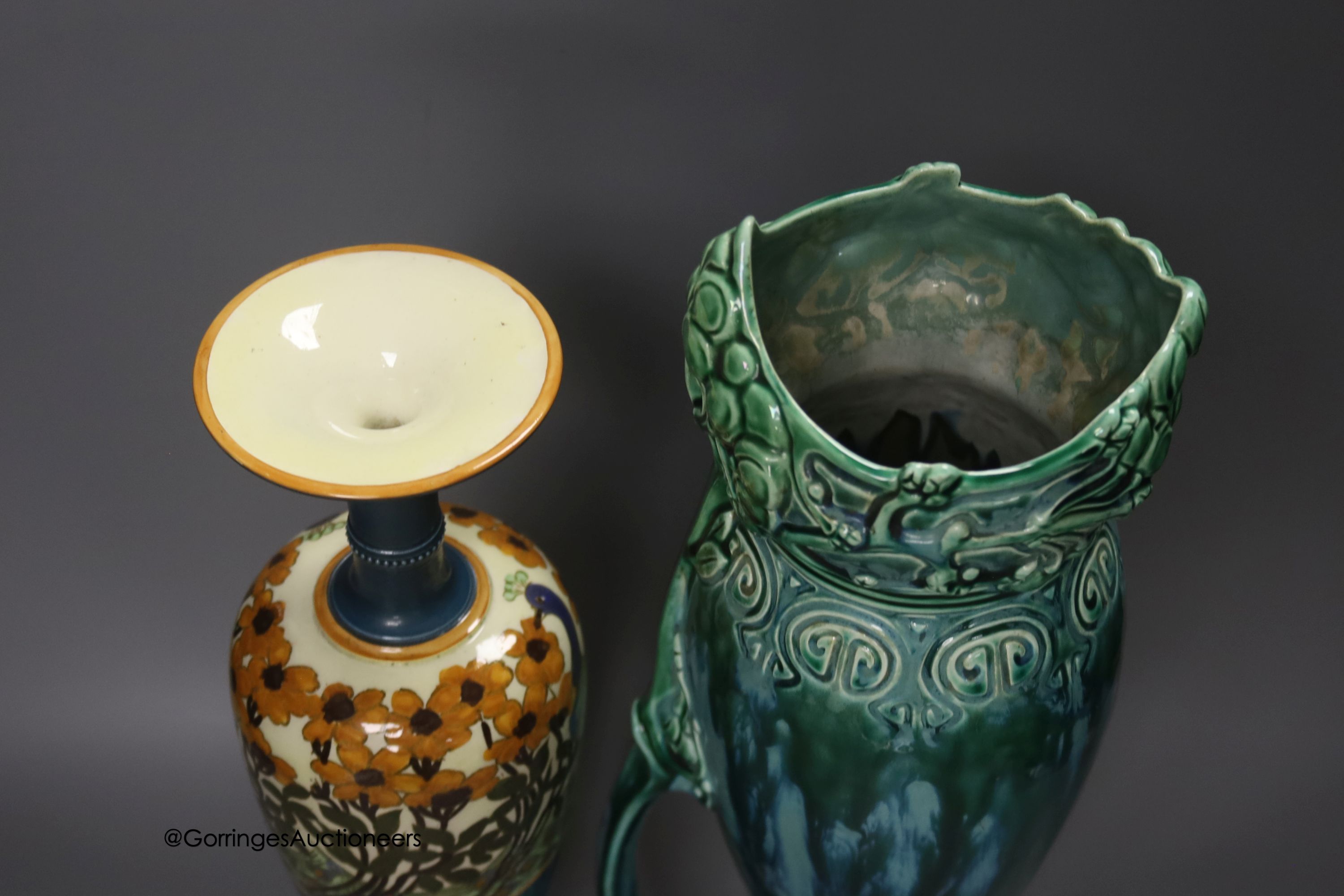 A Royal Staffordshire pottery peacock vase, height 38cm and an Austrian Julius Dressler earthenware ewer with green glaze effects